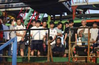 SURVIVORS of the capsized Virgo Transport 8 ferry wait to disembark after their rescue in Banjarmasin, Indonesia, on 14 September.