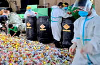 BUREAU of Internal Revenue Region 6 agents oversee the destruction of 240,550 illicit vape products at the DIGAMA Waste Management Facility in Porac, Pampanga.