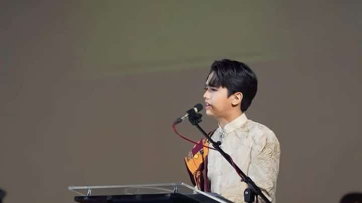 Val Llamelo during his valedictory speech in 2023 at the University of the Philippines.