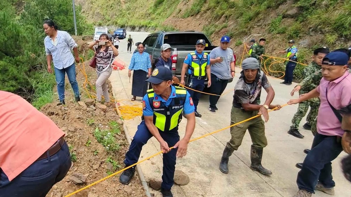 Truck plunges down slope