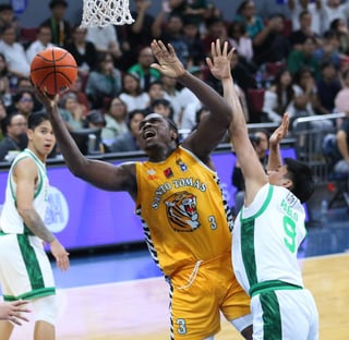 Tigers break Green Archers for first win