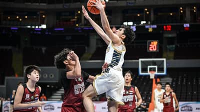 JERICK Geron soars his way to a 16-point effort to lead the NUNS Bullpups to a 110-45 crushing of the UPIS Fighting Maroons in the UAAP Season 89 16U basketball tournament on Wednesday.