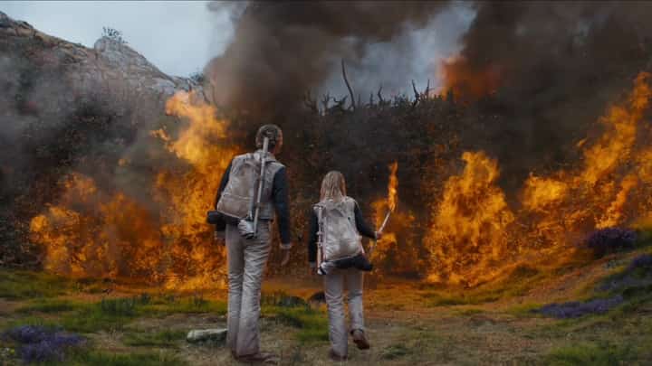 Joseph Zada as young Haymitch Abernathy and McKenna Grace as Maysilee Donner.