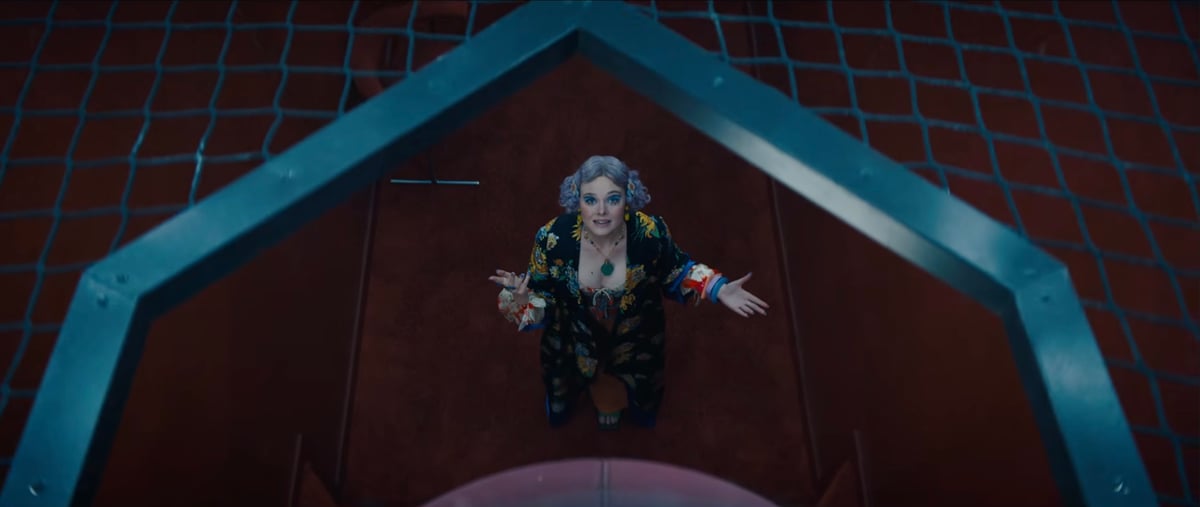 Elle Fanning as Effie Trinket.