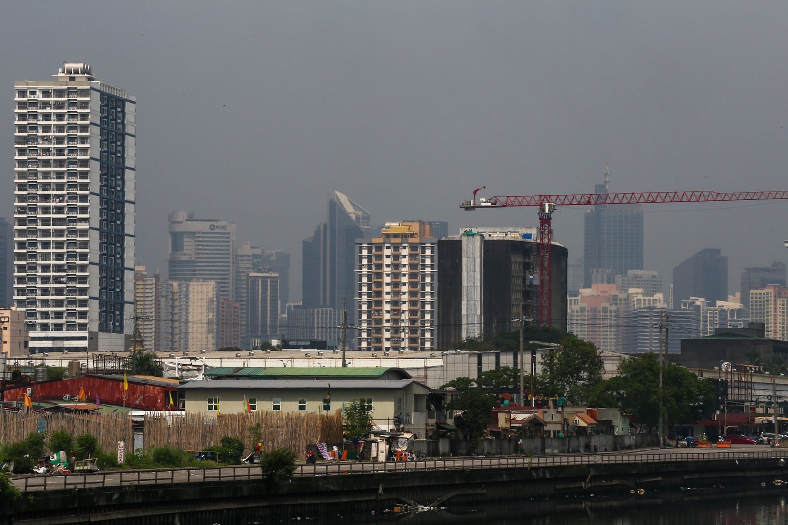 Haze shrouds high-rise buildings in Metro Manila, as seen from JW Diokno Boulevard in Pasay City on 17 September 2026. The Metro Manila air quality index ranged from moderate to unhealthy, according to the IQAir app.