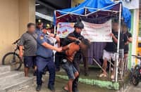 MANDALUYONG City Police tactical units rescue a 52-year-old female hostage and arrested an armed suspect following a standoff on E. Pantaleon Street in Barangay Barangka Drive.