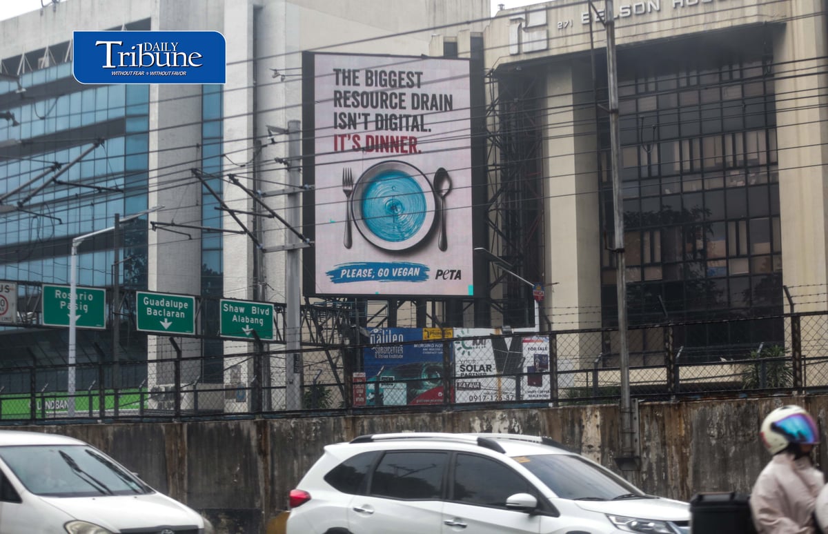 (September 17 2026) The People for the Ethical Treatment of Animals (PETA) launched the first billboard campaign against the proposed pax silica hub stating "The biggest resource drain isn't digital. It's dinner. Please, go vegan" which highlights more concerning environmental and animal welfare costs of the meat, egg, and dairy industries, on electronic billboards along EDSA in Mandaluyong on Thursday. The campaign will expand up to the New Clark City, Tarlac where the proposed Pax Silica hub has drawn scrutiny over its resource consumption and environmental impacts. Photo/Analy Labor