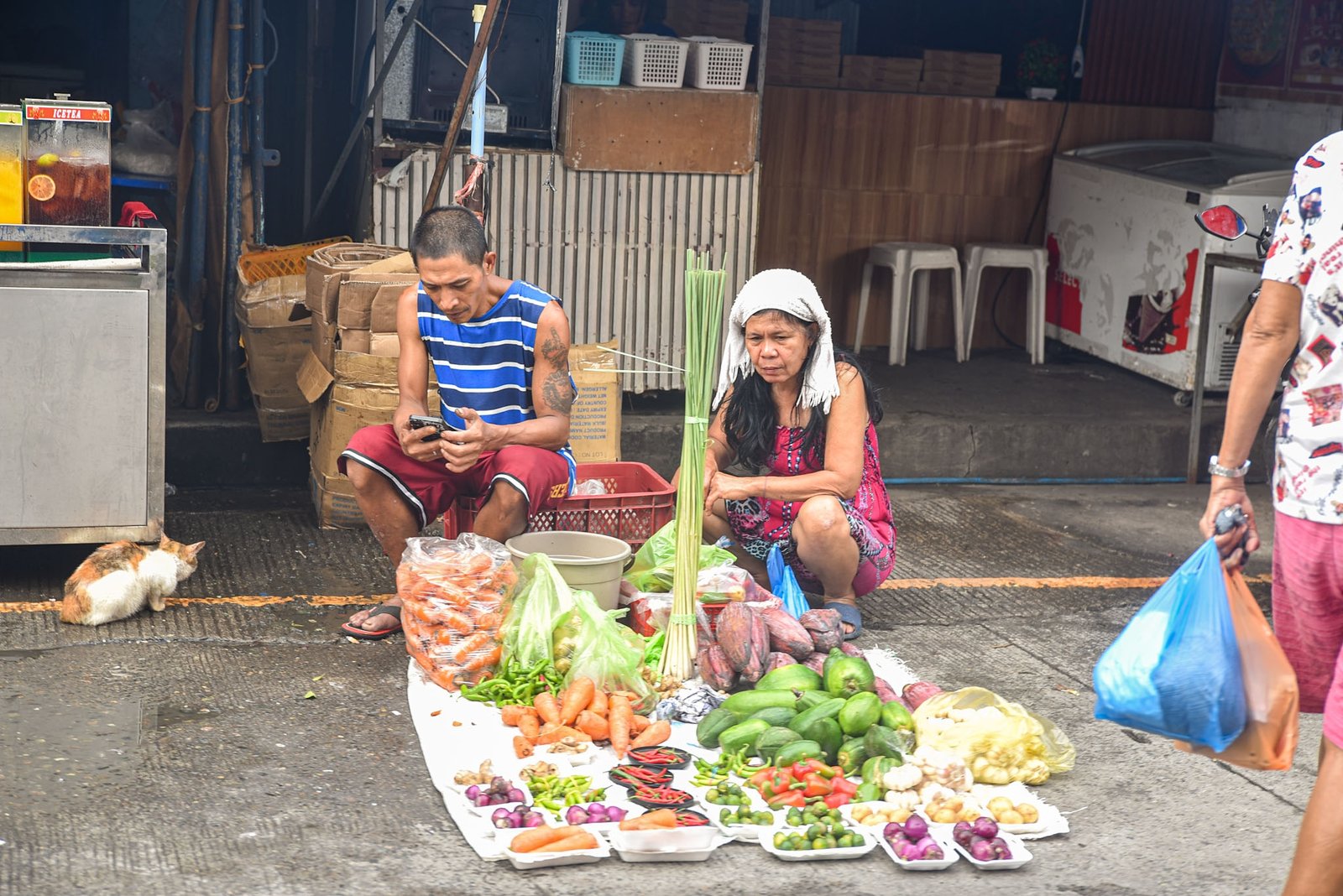 Vendors and buyers are seen browsing vegetables are seen on display along a street in Baseco Compound, Tondo, Manila, on September 18.

Vegetable prices are expected to rise amid higher fuel costs linked to the US-Iran war. l Zedrich Xylak Madrid