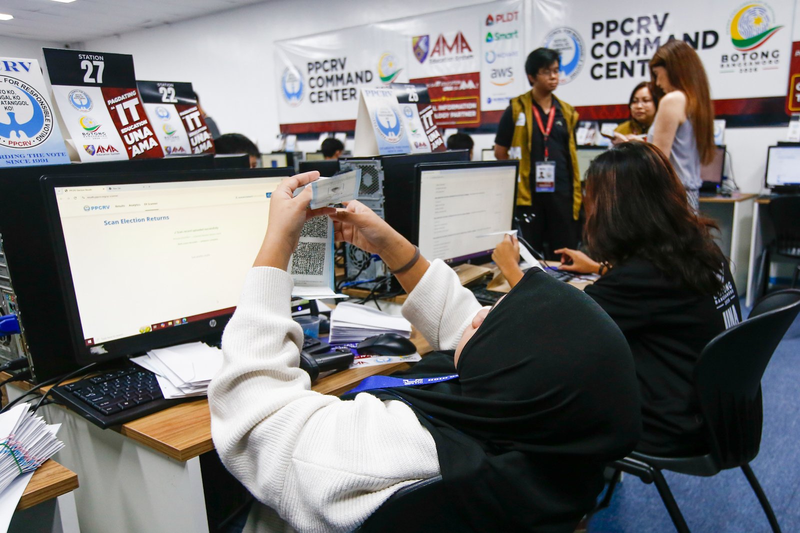 Volunteers scan and verify election returns from various precincts following the September 14 Bangsamoro Parliamentary elections at the PPCRV Command Center in Makati on 18 September 2026. The elected ministers will be replacing the 80-member parliament once the interim parliament ends in October.