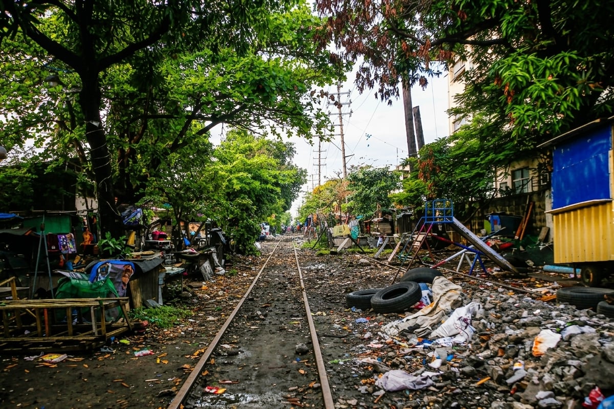 A THRIVING community has taken root along the abandoned train tracks in Tayuman, Manila. The Philippine National Railways suspended operations more than two years ago to make way for a modern rail system, but the promised transformation remains a work in progress.