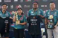 CARY Lagdameo, president of Damosa Land; Sunrise Events Inc. president Princess Galura; Samal Mayor Lemuel Reyes; and Vice Mayor Richard Guindolman showcase the finisher shirts, special medals and commemorative mugs ahead of the Damosa Land 5150 in Samal Island on Sunday.