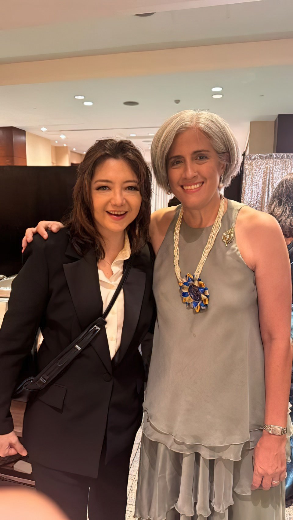 SINGER Victoria Agbayani and Miriam College president Gina Lizares.