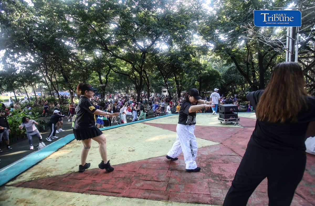 (September 19 2026) Park goers take advantage of the fair weather to join the free Zumba at Quezon City circle on Saturday morning September 19 2026. In the year 2026, health remains the top personal concern for Filipinos, driven by a surge in lifestyle diseases and infectious outbreaks. Photo/Analy Labor