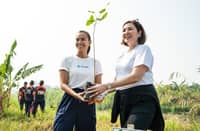 ABOITIZ Foundation, represented by its president Ginggay Hontiveros-Malvar (right), and GCash GForest, represented by Mynt head of corporate sustainability and communications Michelle Fernandez, aim to grow one million trees and help restore 1,200 hectares in Balamban, Cebu.