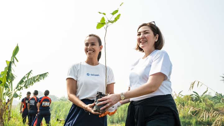 ABOITIZ Foundation, represented by its president Ginggay Hontiveros-Malvar (right), and GCash GForest, represented by Mynt head of corporate sustainability and communications Michelle Fernandez, aim to grow one million trees and help restore 1,200 hectares in Balamban, Cebu.