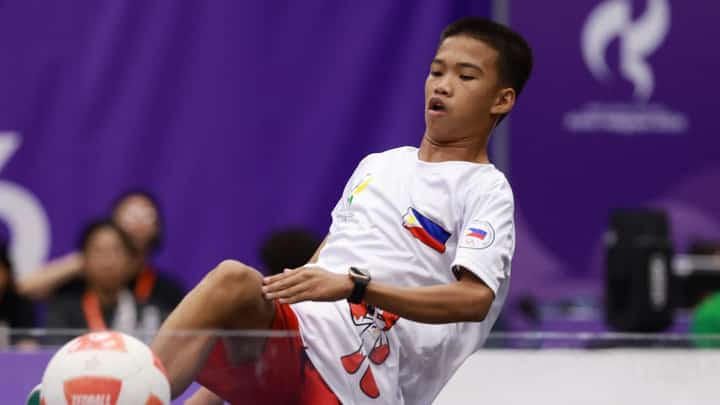 Philippines' Prince Agustin plays a point against Myanmar's Friday Saw during their men's singles bronze medal teqball match at the 2026 Asian Games in Nagoya on September 20, 2026.
