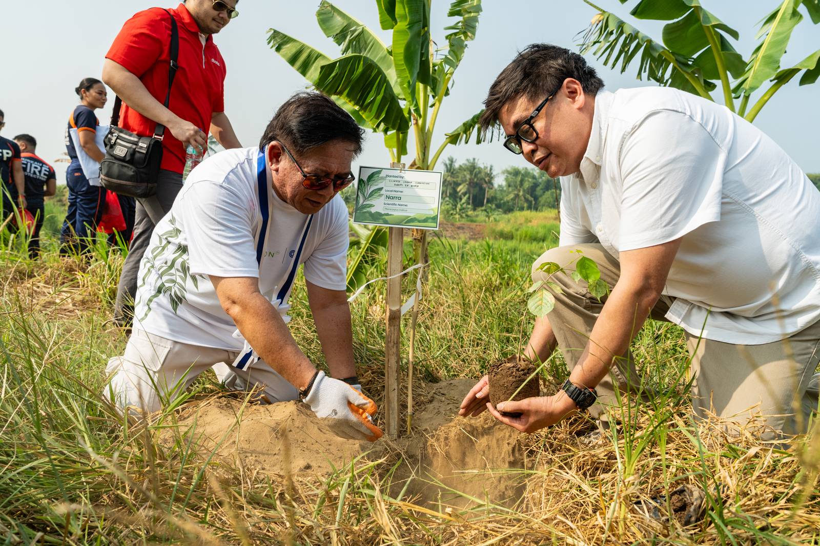 MORE than 3,000 volunteers, including Balamban Mayor Amos Cabahug (left) and Climate Change Commission vice chairman and executive director Robert E. A. Borje, joined communities and partners in planting native trees and bamboo across identified restoration areas, marking CarbonPH’s first major on-ground activation.