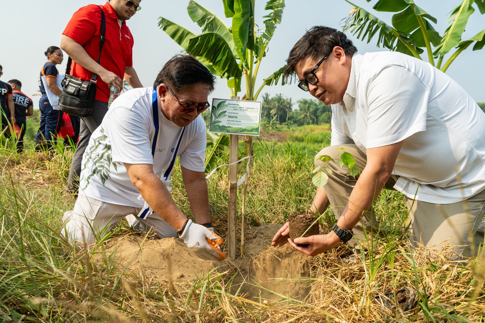 MORE than 3,000 volunteers, including Balamban Mayor Amos Cabahug (left) and Climate Change Commission vice chairman and executive director Robert E. A. Borje, joined communities and partners in planting native trees and bamboo across identified restoration areas, marking CarbonPH’s first major on-ground activation.