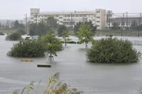 Flights scrapped, evacuations urged as Typhoon Dujuan nears Japan