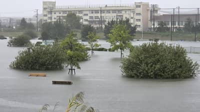 Flooding inundates a park as heavy rain falls amid weather patterns due to Typhoon Dujuan in Ichikawa city, Chiba Prefecture on September 21, 2026.
Typhoon Dujuan forced the cancellation of at least 275 flights in Japan on September 21 and prompted warnings of potentially record-breaking rainfall as the storm nears Tokyo.
STR / JIJI Press / AFP