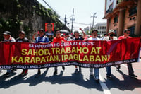 WORKERS PRESS FOR LIVING WAGES