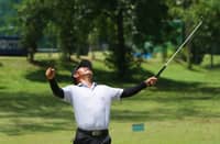 JHONNEL Ababa erupts in celebration after salvaging a five-under 65 to gain a share of lead in the opening round of the ICTSI Negros Occidental Classic on Monday.