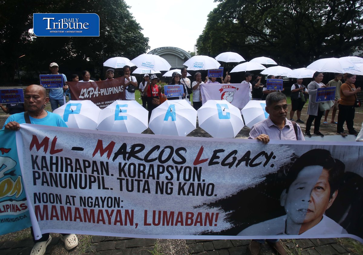 (September 21 2026) In observance of International Day of Peace, a global holiday observed every year on September 21 to commit to peace and stop all violence, and also 54th anniversary of the declaration of Martial Law. Members of Kilusan para sa Pambansang Demokrasya and World BEYOND War Asia hold dozens of white umbrellas symbolizing their call for peace, opposition to Pax Silica, rejection of US-Philippine military agreements, support for a Free Palestine, peace in Myanmar, and the call for “US Out of Asia” during a protest action dubbed PEACE Umbrellas: Shield to Continuous Rain of War and Militarism, at the Bantayog ng mga Bayani in Quezon City on Monday, September 21, 2026. Photo/Analy Labor