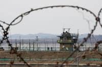 DMZ blast injures three