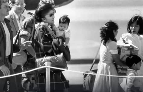 The Marcoses fleeing the Palace.