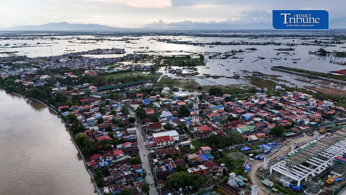 FLOODWATERS SWAMP PARTS OF BULACAN
An aerial view shows floodwaters inundating parts of Calumpit, Bulacan, on Sunday, 20 September 2026.

President Ferdinand Marcos Jr. inspected government projects and programs in Bulacan the following day after directing the Department of Public Works and Highways to pursue long-term measures to address recurring flooding in Bulacan and Pampanga.

📷 Analy Labor