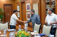 PRESIDENT Ferdinand Marcos Jr. congratulates Bangsamoro Autonomous Region in Muslim Mindanao interim Chief Minister and Bangsamoro Federal Party chairperson Abdulraof Macacua on the successful staging of the historic BARMM parliamentary elections this month.