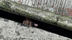 Bizarre sewer rescue near pawnshop triggers burglary suspicions