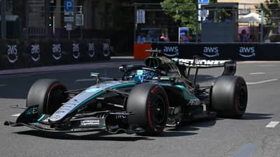 SETTING the tempo in Baku, George Russell guides the Mercedes around the tight confines of the Azerbaijan Grand Prix street circuit.