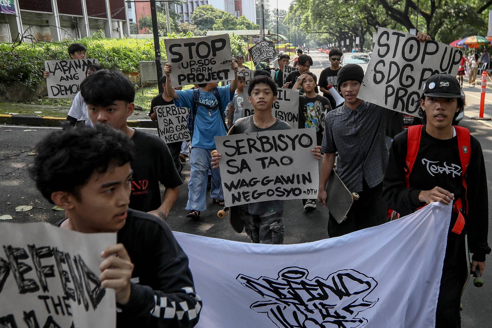 Progressive sports enthusiasts from Skaters United and Defend the Hood staged a protest in front of Palma Hall at UP Diliman, Quezon City, on Saturday, 26 September, to raise concerns over adequate housing and accessible sports facilities in the country.

According to the skaters, many of them live in informal settlements at risk of demolition to make way for businesses. They also called for skate parks to be made more accessible to the general public.

University authorities stopped the protest, prompting the skaters to proceed to Vinzons Hall to continue expressing their concerns. | Aram Lascano for DAILY TRIBUNE