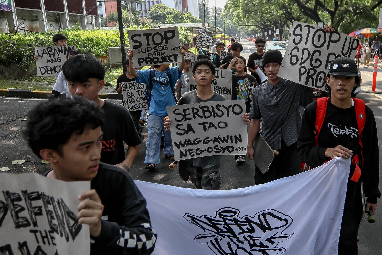 Progressive sports enthusiasts from Skaters United and Defend the Hood staged a protest in front of Palma Hall at UP Diliman, Quezon City, on Saturday, 26 September, to raise concerns over adequate housing and accessible sports facilities in the country.

According to the skaters, many of them live in informal settlements at risk of demolition to make way for businesses. They also called for skate parks to be made more accessible to the general public.

University authorities stopped the protest, prompting the skaters to proceed to Vinzons Hall to continue expressing their concerns. | Aram Lascano for DAILY TRIBUNE