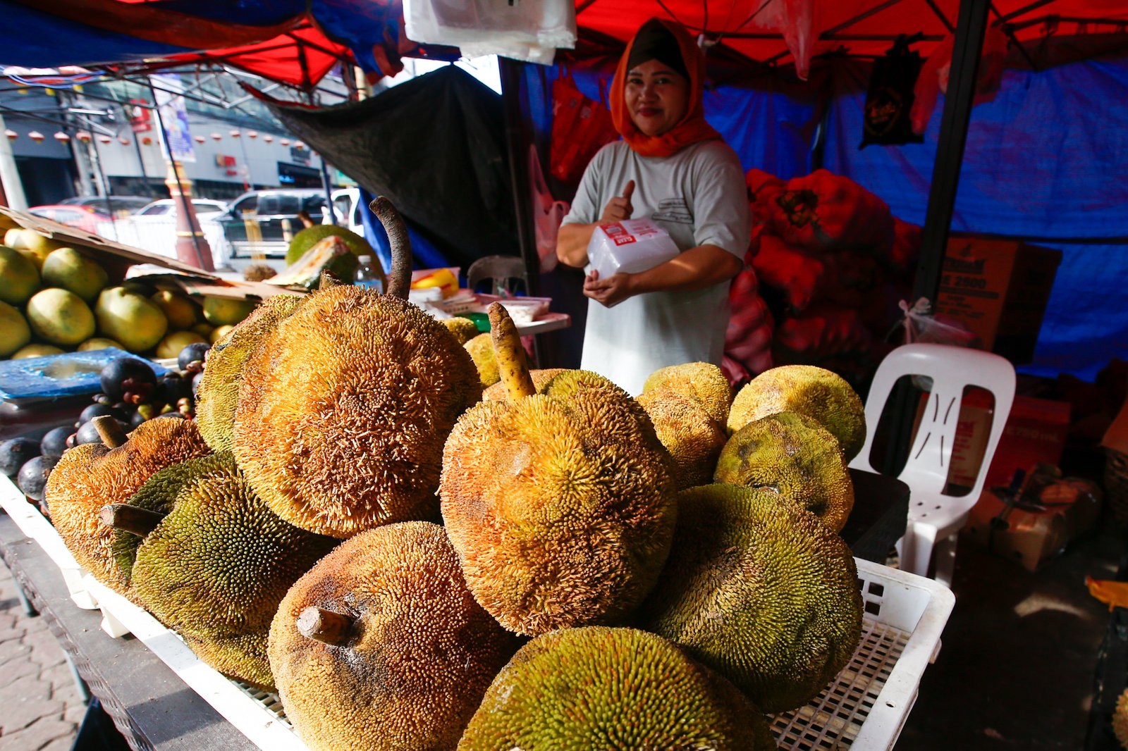 Fresh fruits from Mindanao, including durian, pomelo, marang, jackfruit and mangosteen, are sold at Plaza Calderon dela Barca in Binondo, Manila, on 26 September 2026. The produce is brought to Metro Manila to give Mindanao farmers wider market access while making their seasonal harvests available to consumers in the capital.