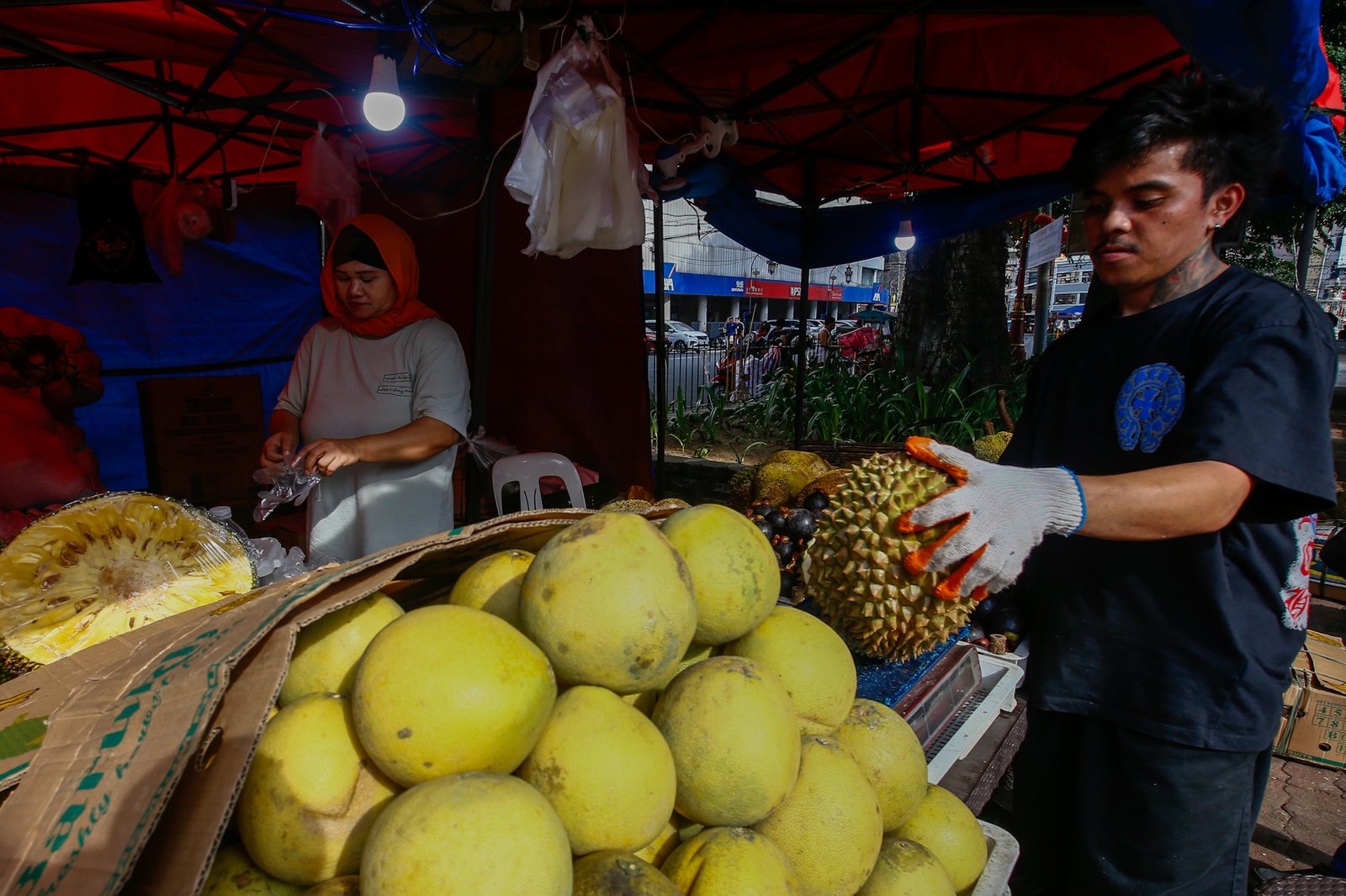 Fresh fruits from Mindanao, including durian, pomelo, marang, jackfruit and mangosteen, are sold at Plaza Calderon dela Barca in Binondo, Manila, on 26 September 2026. The produce is brought to Metro Manila to give Mindanao farmers wider market access while making their seasonal harvests available to consumers in the capital.