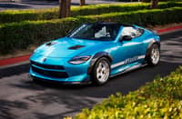 OPEN-AIR character defines the Z Kaze, which draws from earlier Z models and the Japanese tuner culture of the 1990s.