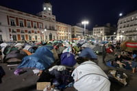 Madrid protest camp grows after eviction outrage