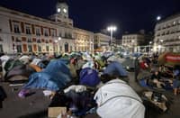 DEMONSTRATORS wake up as they camp one day after a protest against evictions and the housing crisis in front of the Presidency of the Community of Madrid on the Puerta del Sol plaza in Madrid, Spain on 27 September 2026.