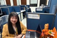 ANGELICA at her work station: I would be honored to continue serving the University.