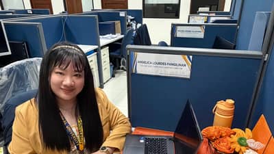 ANGELICA at her work station: I would be honored to continue serving the University.