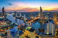 AN AERIAL view of Bangkok’s skyline and the Chao Phraya River at sunset.