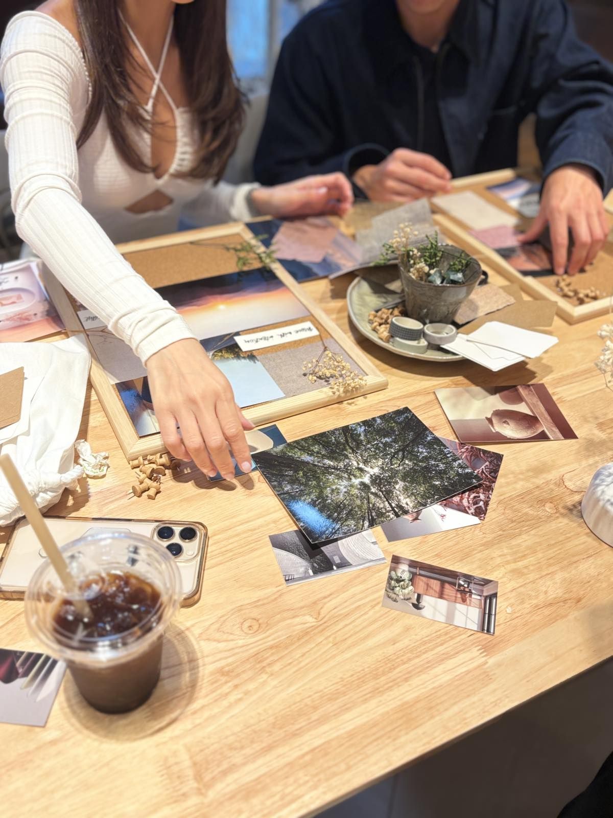 GUESTS work on their Japandi-inspired mood boards.