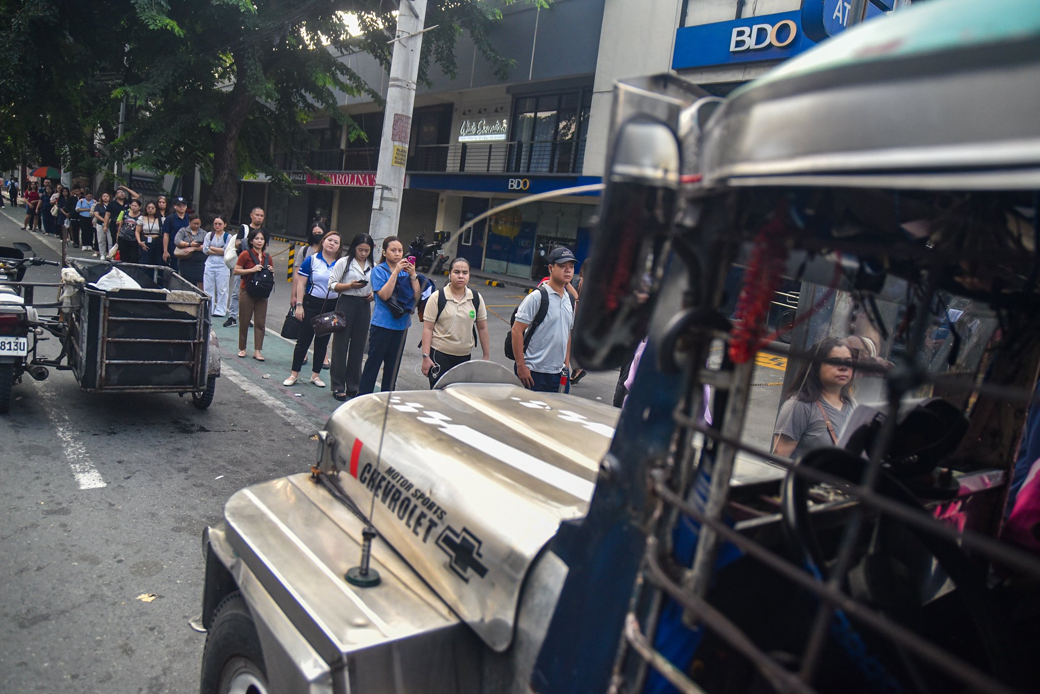 Commuters bound to Makati ride jeepneys amid transport strike, fare hike