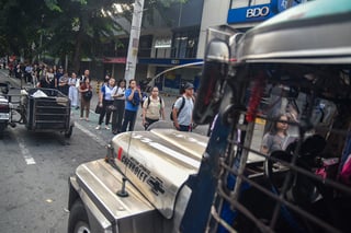 Commuters bound to Makati ride jeepneys amid transport strike, fare hike