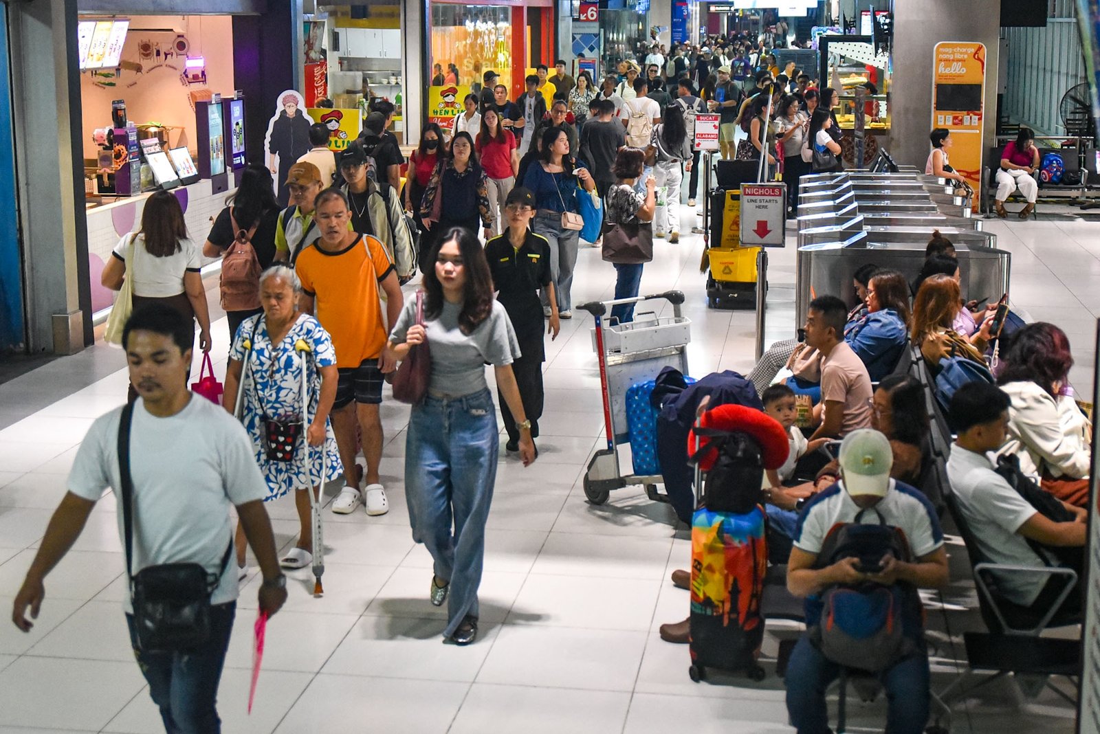 Passengers bound for Cavite and other destinations from Metro Manila flock to the Parañaque Integrated Terminal Exchange (PITX as fewer buses operate amid rising oil prices on September 28.

Bus passengers face higher fares as Metro Manila and city buses now charge ₱15 for the first five kilometers for ordinary buses and ₱18 for air-conditioned buses, while provincial buses start at ₱12 for the first five kilometers. l Zedrich Xylak Madrid