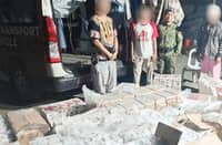 POLICE officers inspect master cases of alleged smuggled cigarettes valued at P1.08 million following a highway checkpoint operation in Kapatagan, Lanao del Norte, on Tuesday.