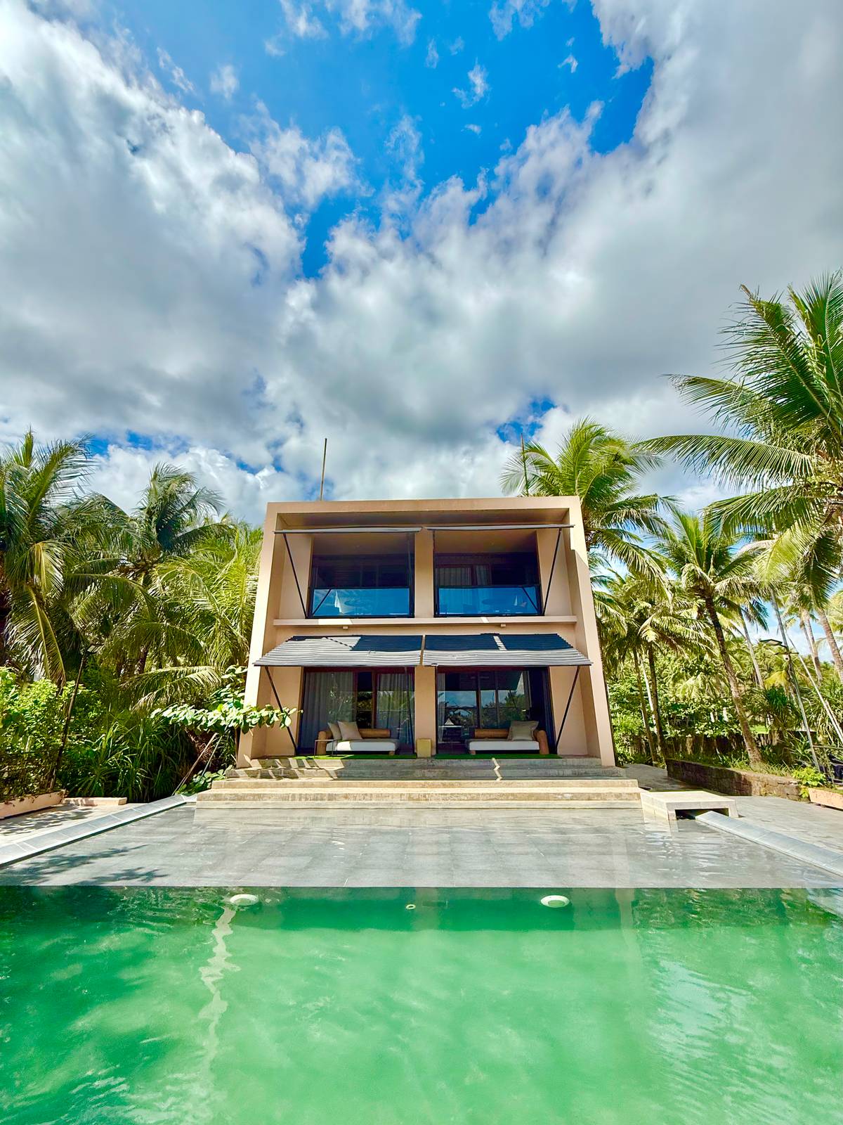 THE design language of polished concrete, locally sourced hardwoods and expansive glass panels dissolve the boundary between indoor curation.