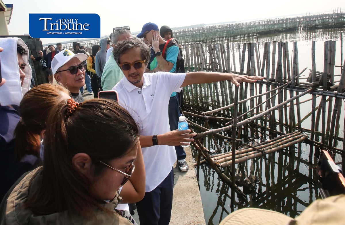 (September 29 2026) DPWH Secretary Vince Dizon along with delegates from Netherlands inspect the Nature-Based coastal protection project at Pamarawan, Malolos Bulacan on Tuesday September 29 2026. The project uses interlocking bamboo and cribbing to reduce incoming wave energy to the shoreline. Oyster bags and sediment traps capture drifting mud and sand, gradually raising the low-lying seabed while encouraging natural oyster reef recovery and creating localized aquatic habitats. The project was developed by Dutch engineering firm Haskoning in partnership with the Malolos City government. Photo/Analy Labor